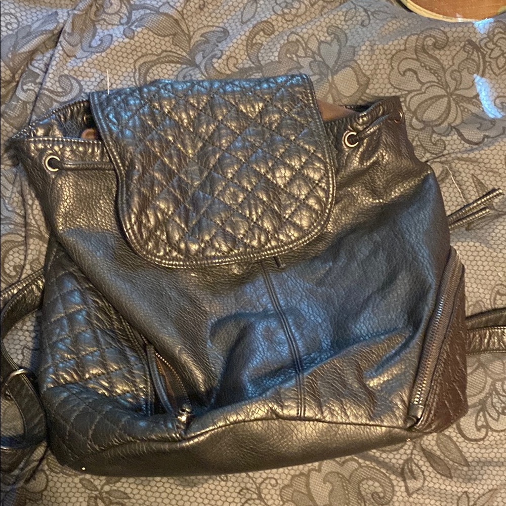 Black fake leather backpack style bag
